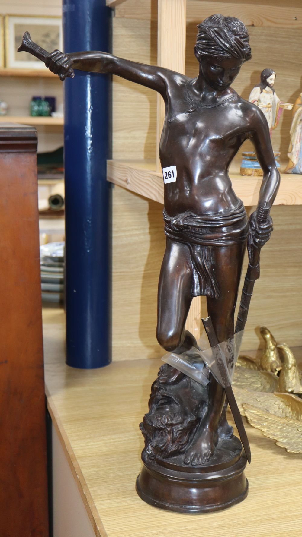 After Antonin Mercie. A modern bronze of David having defeated Goliath, height 70cm